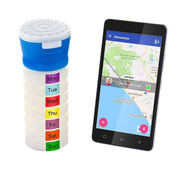 The iRemember weekly pill organizer with app showing device location on map.